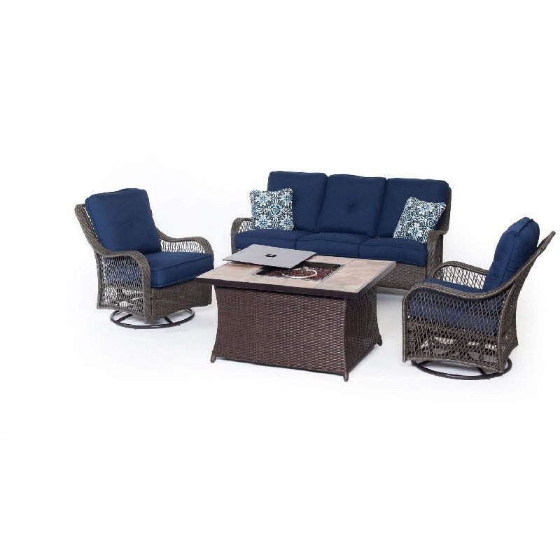 HANOVER ORLEANS4PCFP-NVY-B ORLEANS 4-PIECE WOVEN LOUNGE SET WITH NATURAL STONE FIRE PIT TABLE IN NAVY BLUE, BLUE KALEIDOSCOPE PILLOW PATTERN