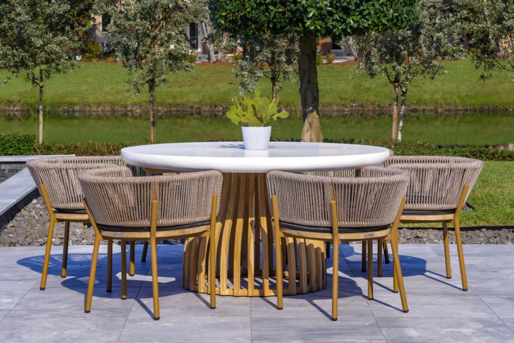OUTSY 0AMEL-W11-GR-R MELINA 7-PIECE OUTDOOR DINING SET - TEAK AND RESIN ROUND TABLE AND 6 WOOD, ALUMINUM, AND ROPE CHAIRS WITH MILK AND COFFEE LEGS