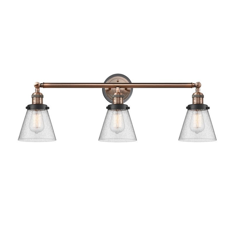 INNOVATIONS LIGHTING 205BP-ACBK-G64 FRANKLIN RESTORATION SMALL CONE 3 LIGHT 30 INCH SEEDY GLASS VANITY LIGHT - ANTIQUE COPPER/MATTE BLACK