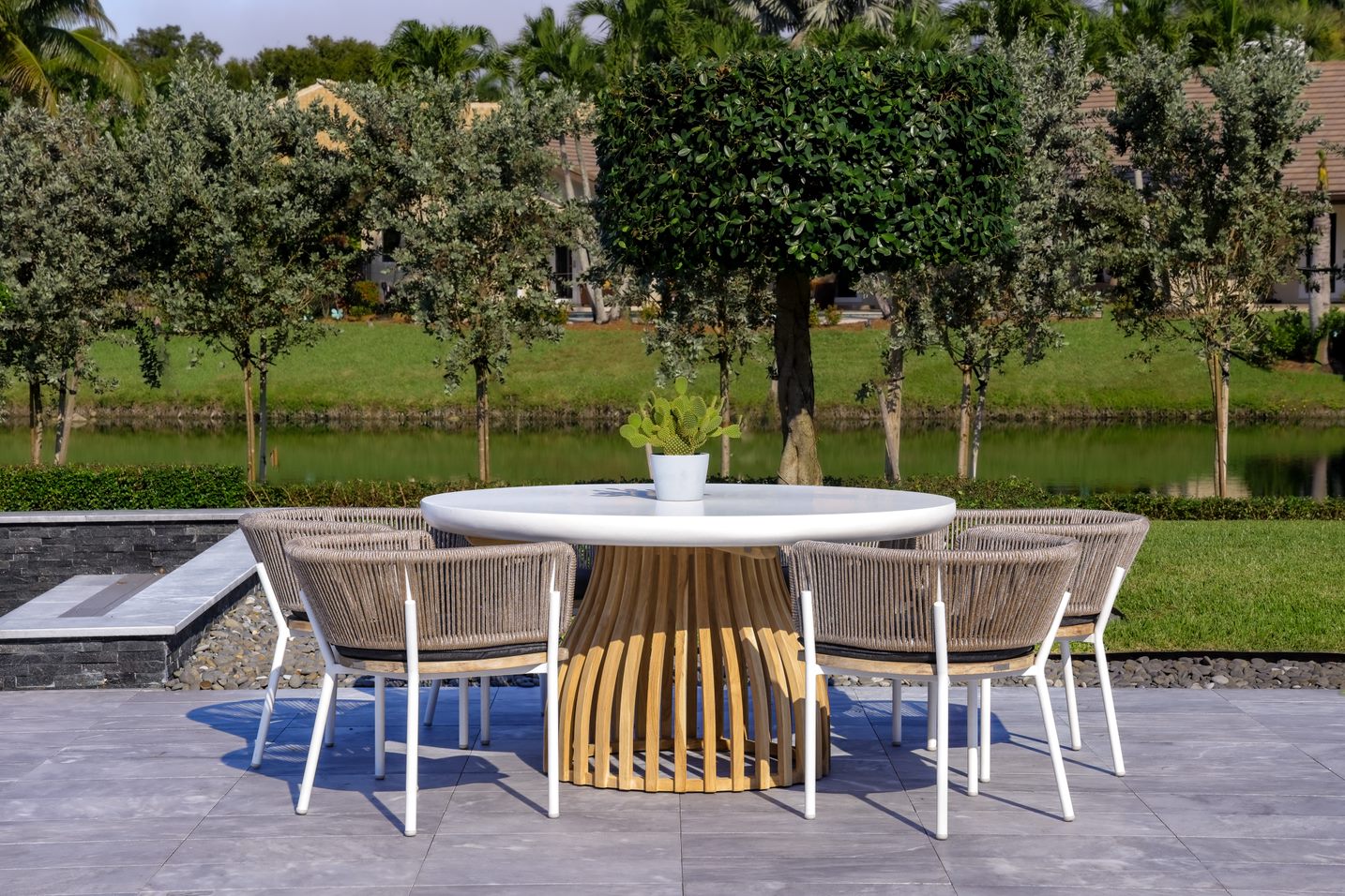 OUTSY 0AMEL-W11-WH-R MELINA 7-PIECE OUTDOOR DINING SET - TEAK AND RESIN ROUND TABLE AND 6 WOOD, ALUMINUM, AND ROPE CHAIRS WITH WHITE LEGS